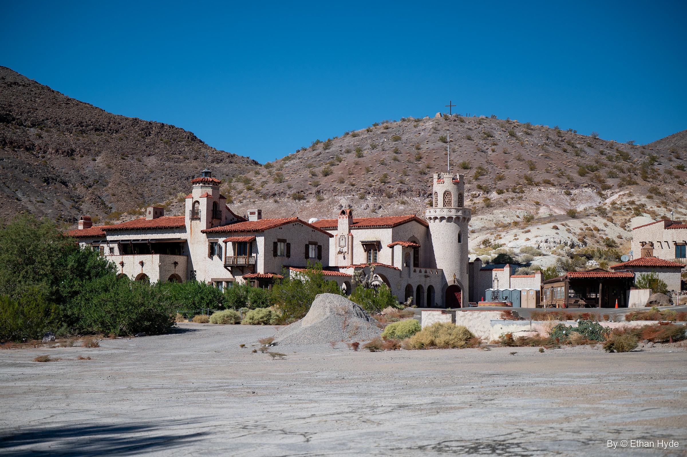 Scotty's Castle (Death Valley Ranch), a Spanish Colonial Revival villa of stucco walls and red tile roofs in Grapevine Canyon, Death Valley National Park.